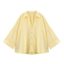 Chic Women's Blouse with Statement Sleeves and Button Front