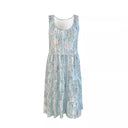 Airy Summer Dress with Flowing Skirt and Decorative Accents