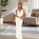 Stunning Evening Dress with Deep Neckline and Shimmering Detailing