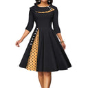 Chic Midi Dress with Dots & Contrast Trim