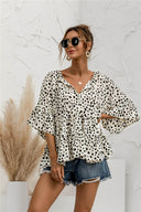 Chic Ruffle Detail Blouse with Modern Polka Dot Design