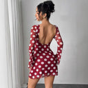 Chic Women's Mini Dress with Unique Back Cutout and Contemporary Dot Design