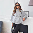Stylish Cape Blouse with Pleated Detail and Accent Belt