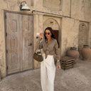 Chic Women's Blouse with Knot Detail & Stylish Cuffs
