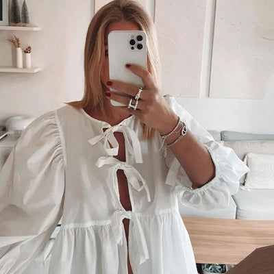 Stylish Checkered Blouse with Unique Cut-Out Design