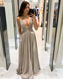 Stunning Evening Dress with Deep V-Neck and Dazzling Accents