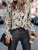 Chic Blouse with Stylish Collar and Bold Animal Print