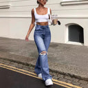 Trendy High-Waist Flared Jeans with Chic Ripped Accents