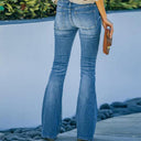 High-Waisted Flared Jeans with Button Accents