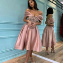 Chic Evening Dress with Shimmering Top and Flutter Sleeves