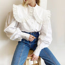 Women’s Stylish Blouse with Dramatic Sleeves and Ruffled Hem