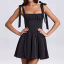 Chic Summer Dress with Cutout Back and Bow Details