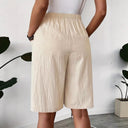 Chic Women's Knee-Length Wrap Skirt with Elastic Waist and Convenient Pockets