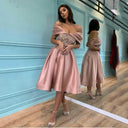 Chic Evening Dress with Shimmering Top and Flutter Sleeves