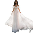 Chic Wedding Dress with Sheer Puff Sleeves and Glittering Bodice