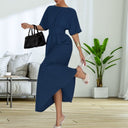 Stylish Midi Dress with Deep Back and Bow Detail