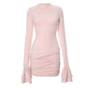 Chic Mini Dress with Statement Sleeves and Ruching Details