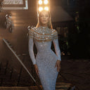 Chic Evening Dress with Sheer Bodice and Decorative Details