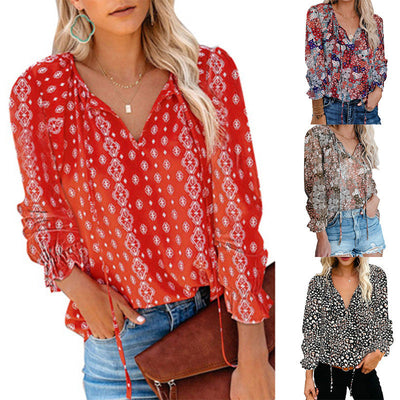 Animal Print Blouse with Fringed Sleeves