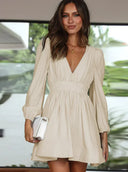 Chic White Pleated Dress with Ruffled Sleeves