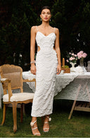 Chic Midi Dress with Unique Cut-Out Design and Artistic Pattern