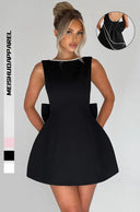Chic Sculptural Mini Dress with Pearl Accents
