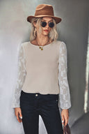 Chic Women's Top with Sheer Sleeve Design