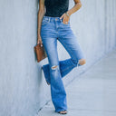 Trendy High-Waisted Flared Jeans with Chic Rips