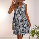 Floral Print Sleeveless Dress with Flared Skirt