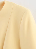 Chic Women's Blazer Jacket with Stylish Button Accents and Handy Pockets