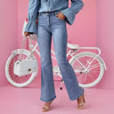 Chic Denim Blouse with Ruffled Accents and Knotted Neckline