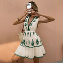 Artistic Embroidered Mini Dress with Flared Hem