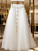 Chic Long Skirt with Button Accents and Shimmering Waistband
