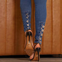 High-Waist Skinny Jeans with Trendy Distressed Design