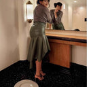 Chic Faux Leather Midi Skirt with Flowing Hem