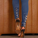 Women's High-Waist Jeans with Unique Button Design
