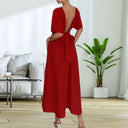Stylish Midi Dress with Deep Back and Bow Detail