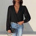 Chic Bodysuit with Statement Sleeves and V-Neck Design