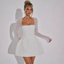 Chic Mini Dress with Sheer Lace Sleeves and Bodycon Fit