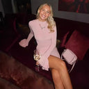 Chic Mini Dress with Statement Sleeves and Ruching Details
