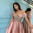 Chic Evening Dress with Shimmering Top and Flutter Sleeves