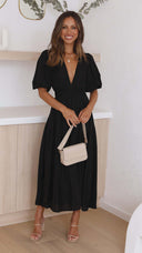 Chic Maxi Dress with Deep V-Neck and Flowy Skirt