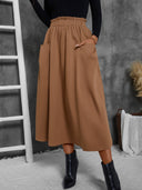 Chic Midi Skirt with Elastic Waist and Pocket Design