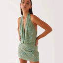 Elegant Sheath Dress with Deep V-Neck and Embroidered Detailing