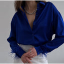 Chic Satin Blouse with Feather Accents