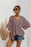 Chic Ruffle Detail Blouse with Modern Polka Dot Design