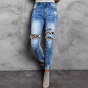Stylish Women's Destroyed Jeans with Unique Animal Prints