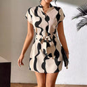 Stylish Women's Short Dress with Unique Cut