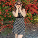 Chic Checkered Dress with Adjustable Straps and Bow Detail