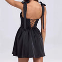 Chic Summer Dress with Cutout Back and Bow Details